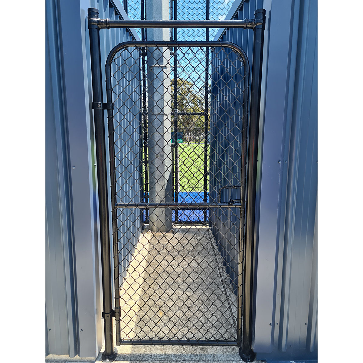 Galvanised chain mesh double vehicle gate with security topping wire