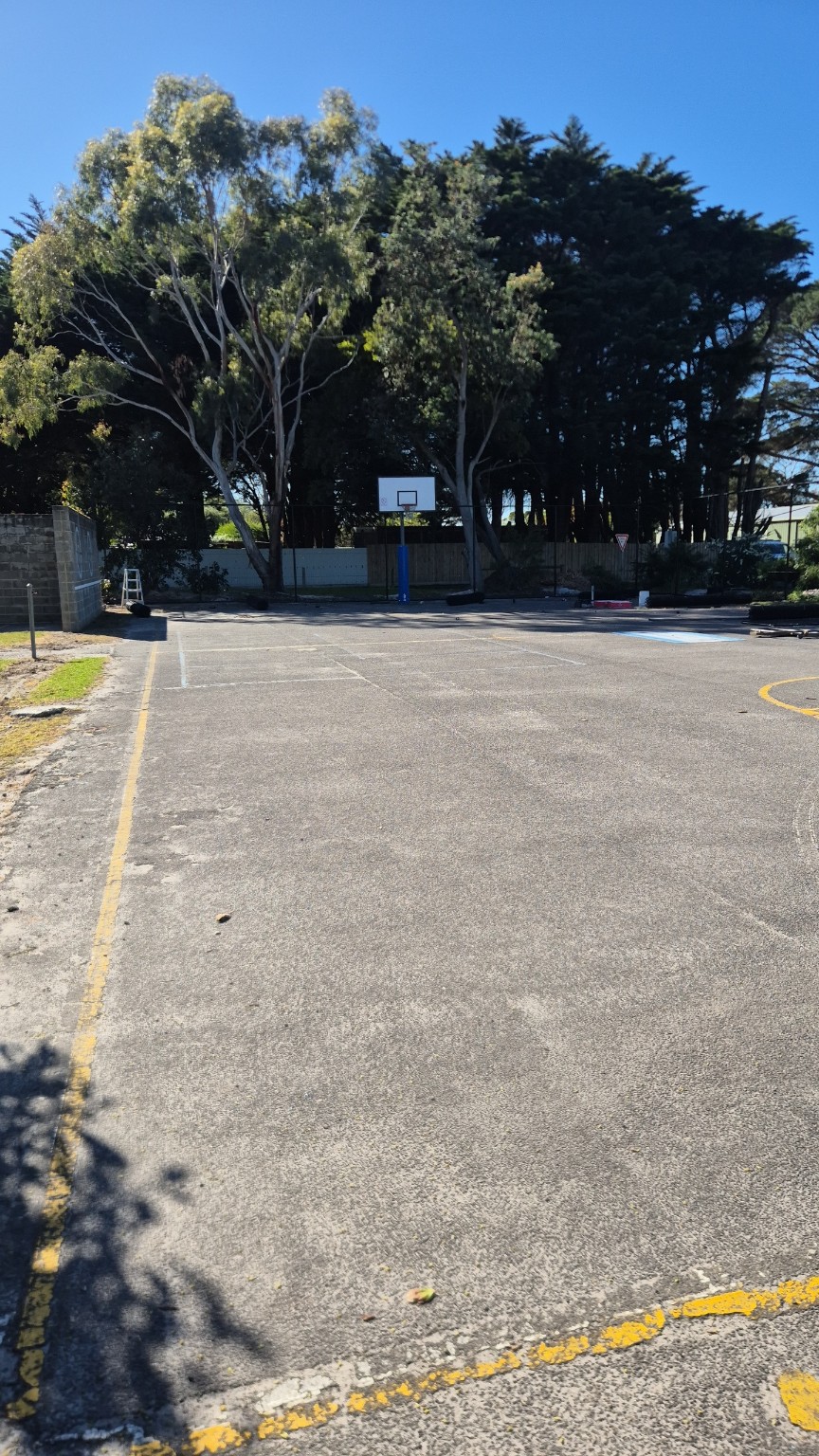 Basketball court during the fencing replacement with the open side visible at Tarwin Lower Primary School